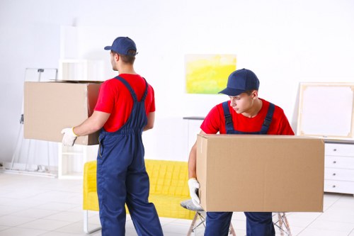 Furniture removals team handling a sofa move in Elephant and Castle