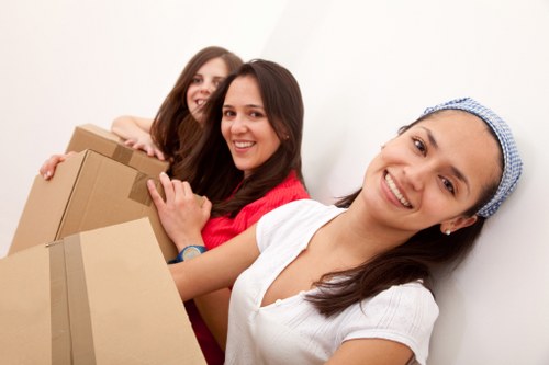 Packed boxes and furniture prepared for storage in a South London property