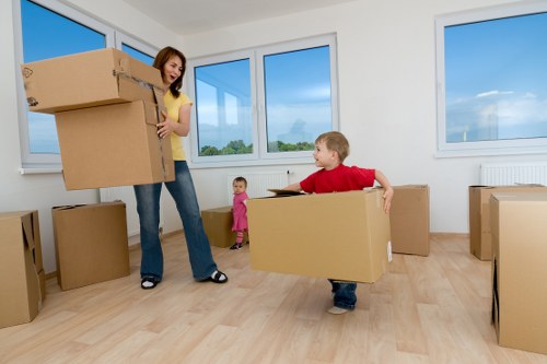 Office furniture and boxes prepared for a commercial move in South London