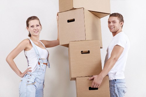 Professional movers handling office furniture and boxes in Elephant and Castle