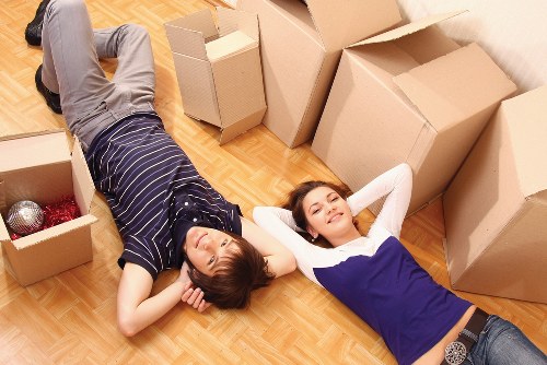 Furniture and boxes being transported by a moving truck service